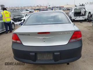 2006 Chrysler Sebring Touring z VIN 1C3AL56R66N126068, wystawiony jako IAAI lot #42210890 z przebiegiem 161 335 mil mil oraz . Historia ofert i sprzedaży dostępna na DreamBid. Obrazek 16.