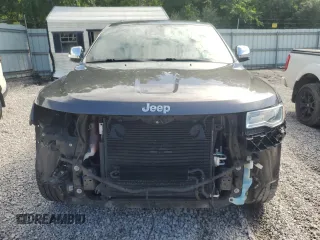 2014 Jeep Grand Cherokee Summit with VIN 1C4RJFJT4EC346946, listed as a Copart auction lot 60613025 with 50,565 mi miles and Salvage title. Bid and sale history available at DreamBid. Image 5.
