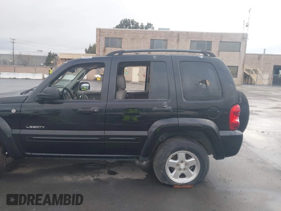 2004 Jeep Liberty Limited with VIN 1J4GL58K94W318379, listed as a IAAI auction lot 41802645 with 275,834 mi miles. Bid and sale history available at carsss.com. Image 14.