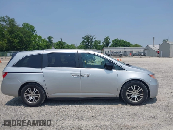 2012 Honda Odyssey EX z VIN 5FNRL5H44CB038825, wystawiony jako IAAI lot #42411401 z przebiegiem 214 164 mil mil oraz . Historia ofert i sprzedaży dostępna na DreamBid. Obrazek 13.