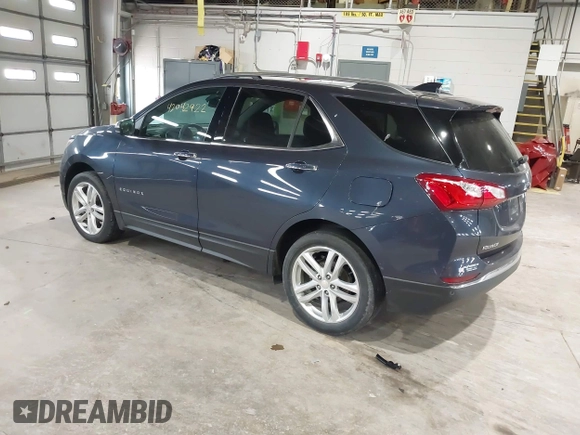 2019 Chevrolet Equinox Premier z VIN 3GNAXNEVXKS500672, wystawiony jako IAAI lot #42042922 z przebiegiem 77 440 mil mil oraz . Historia ofert i sprzedaży dostępna na DreamBid. Obrazek 3.