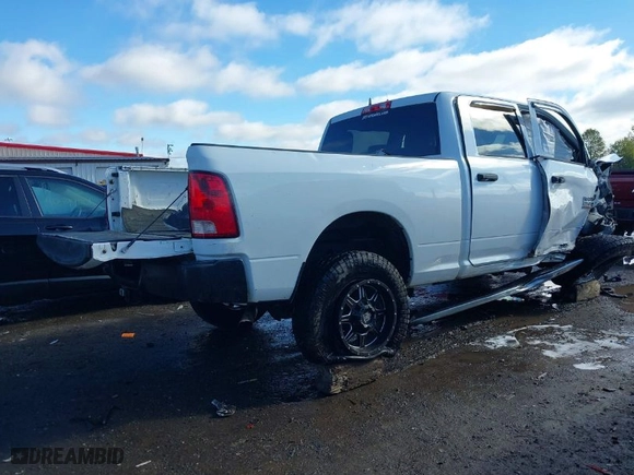 2014 Ram 2500 Tradesman with VIN 3C6TR5CT1EG234972, listed as a IAAI auction lot 40605313 with 170,001 mi miles. Bid and sale history available at carsss.com. Image 4.