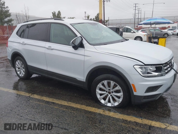2018 Volkswagen Tiguan S z VIN 3VV1B7AX4JM121567, wystawiony jako IAAI lot #41581113 z przebiegiem Nie podano mil oraz . Historia ofert i sprzedaży dostępna na DreamBid. Obrazek 1.