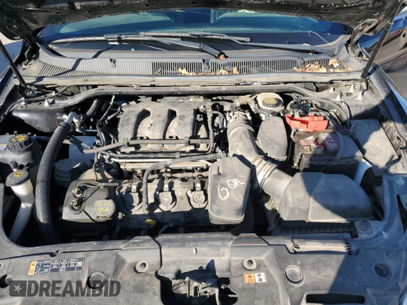 2019 Ford Taurus SEL with VIN 1FAHP2E87KG100508, listed as a Copart auction lot 78101304 with 128,062 mi miles and Salvage Title. Bid and sale history available at DreamBid. Image 12.