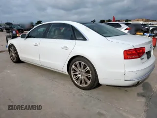 2014 Audi A8 3.0T with VIN WAURGAFD1EN013057, listed as a Copart auction lot 61161595 with 103,560 mi miles and Salvage title. Bid and sale history available at DreamBid. Image 2.