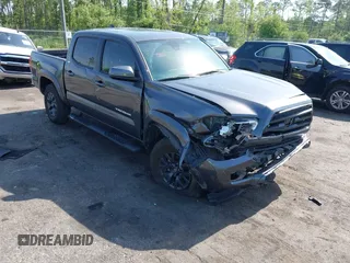 2023 Toyota Tacoma SR5 z VIN 3TYAZ5CN6PT039184, wystawiony jako IAAI lot #42278183 z przebiegiem 41 180 mil mil oraz . Historia ofert i sprzedaży dostępna na DreamBid. Obrazek 1.