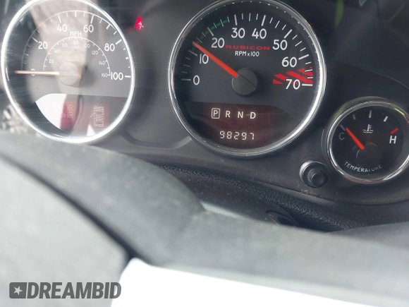 2013 Jeep Wrangler Rubicon 10th Anniversary with VIN 1C4BJWCG2DL651815, listed as a IAAI auction lot 41643919 with 98,297 mi miles and . Bid and sale history available at DreamBid. Image 15.
