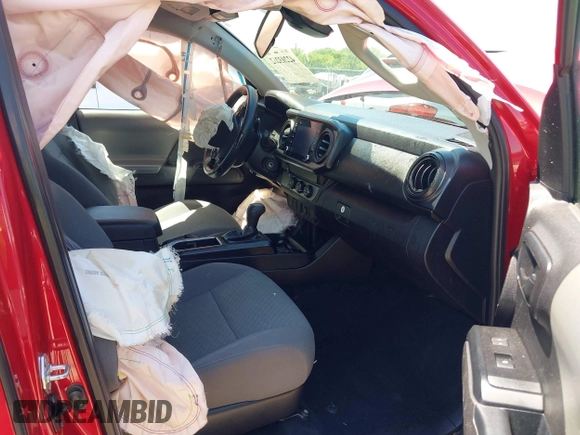 2021 Toyota Tacoma SR with VIN 3TYRX5GN6MT016261, listed as a IAAI auction lot 42203262 with 78,744 mi miles and . Bid and sale history available at DreamBid. Image 5.