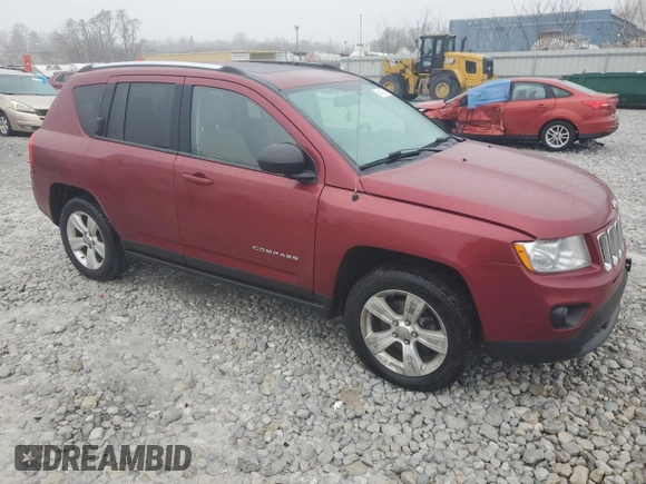 2012 Jeep Compass Latitude with VIN 1C4NJCEAXCD651896, listed as a Copart auction lot 86442794 with 92,181 mi miles and Salvage Title. Bid and sale history available at DreamBid. Image 4.