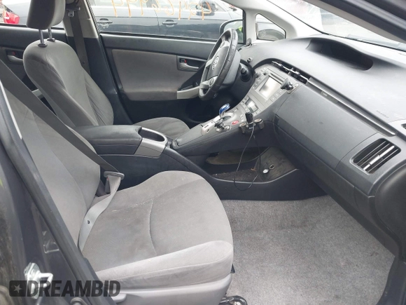 2012 Toyota Prius One z VIN JTDKN3DU4C5405276, wystawiony jako IAAI lot #42466994 z przebiegiem 248 061 mil mil oraz . Historia ofert i sprzedaży dostępna na DreamBid. Obrazek 5.