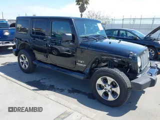 2017 Jeep Wrangler Unlimited 75th Anniversary z VIN 1C4BJWEG4HL733872, wystawiony jako IAAI lot #42131506 z przebiegiem 57 492 mil mil oraz . Historia ofert i sprzedaży dostępna na DreamBid. Obrazek 1.