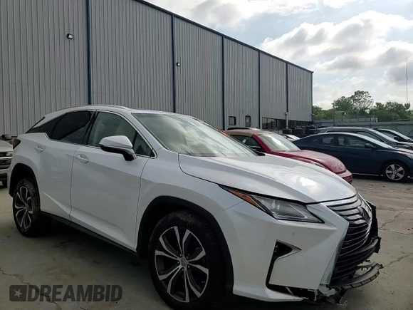 2017 Lexus RX 350 z VIN 2T2BZMCA9HC061208, wystawiony jako Copart lot #59913175 z przebiegiem 57 781 mil mil oraz Szkoda całkowita • Salvage title. Historia ofert i sprzedaży dostępna na DreamBid. Obrazek 14.
