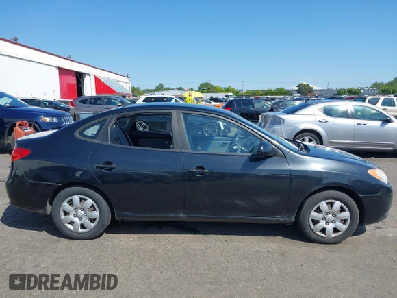 2009 Hyundai Elantra SE z VIN KMHDU46D39U670425, wystawiony jako IAAI lot #42094937 z przebiegiem 174 545 mil mil oraz . Historia ofert i sprzedaży dostępna na DreamBid. Obrazek 14.