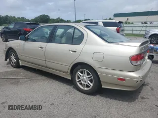 2001 Infiniti G20 Luxury z VIN JNKCP11A61T404490, wystawiony jako Copart lot #62502544 z przebiegiem 132 014 mil mil oraz Tytuł czysty. Historia ofert i sprzedaży dostępna na DreamBid. Obrazek 2.