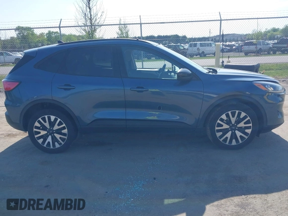 2020 Ford Escape SE Sport Hybrid with VIN 1FMCU9BZ6LUC38008, listed as a IAAI auction lot 42143784 with 81,804 mi miles and . Bid and sale history available at DreamBid. Image 13.