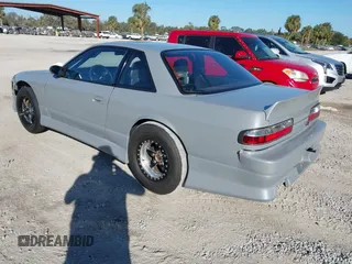 1992 Nissan 240SX z VIN JN1MS34P9NW100593, wystawiony jako IAAI lot #40867667 z przebiegiem Nie podano mil oraz . Historia ofert i sprzedaży dostępna na DreamBid. Obrazek 3.