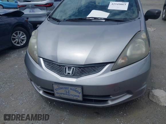 2010 Honda Fit z VIN JHMGE8H2XAS020698, wystawiony jako IAAI lot #42549063 z przebiegiem 260 454 mil mil oraz . Historia ofert i sprzedaży dostępna na DreamBid. Obrazek 6.