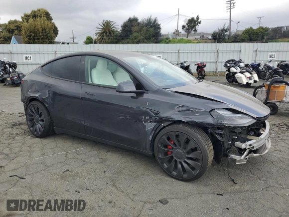 2024 Tesla Model Y Performance with VIN 7SAYGDEF7RF093054, listed as a Copart auction lot 50747985 with 26,907 mi miles and Salvage Title. Bid and sale history available at DreamBid. Image 4.