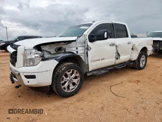 2021 Nissan Titan Pro-4X z VIN 1N6AA1FB1MN519581, wystawiony jako Copart lot #62878345 z przebiegiem 84 477 mil mil oraz Szkoda całkowita • Salvage title. Historia ofert i sprzedaży dostępna na DreamBid. Obrazek 1.
