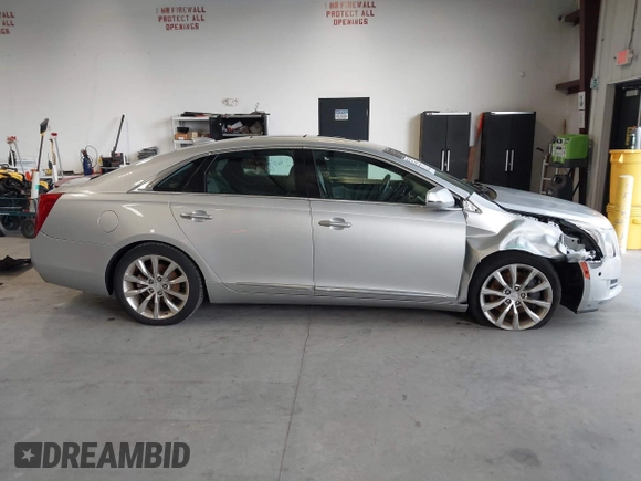 2016 Cadillac XTS Luxury Collection with VIN 2G61M5S34G9189820, listed as a IAAI auction lot 42660069 with 72,489 mi miles and . Bid and sale history available at DreamBid. Image 13.