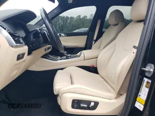 2020 BMW X5 sDrive40i with VIN 5UXCR4C0XLLW63728, listed as a Copart auction lot 56112475 with 65,704 mi miles and Clean title. Bid and sale history available at DreamBid. Image 7.