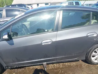 2010 Honda Insight EX with VIN JHMZE2H72AS021555, listed as a IAAI auction lot 42129289 with 172,829 mi miles and . Bid and sale history available at DreamBid. Image 15.