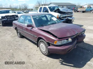 1991 Toyota Camry z VIN 4T1VV22E5MU051774, wystawiony jako IAAI lot #42080078 z przebiegiem 105 149 mil mil oraz . Historia ofert i sprzedaży dostępna na DreamBid. Obrazek 1.