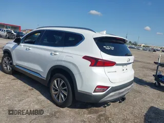 2019 Hyundai Santa Fe SEL with VIN 5NMS33AD6KH081690, listed as a IAAI auction lot 41961423 with 114,389 mi miles and . Bid and sale history available at DreamBid. Image 3.