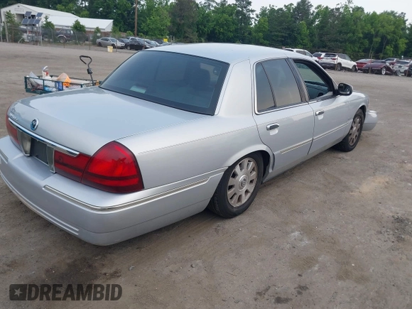 2003 Mercury Grand Marquis LS Premium z VIN 2MEFM75W03X658118, wystawiony jako IAAI lot #42435812 z przebiegiem 174 893 mil mil oraz . Historia ofert i sprzedaży dostępna na DreamBid. Obrazek 4.
