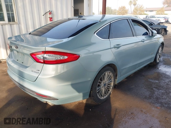 2014 Ford Fusion SE Hybrid with VIN 3FA6P0LU8ER283409, listed as a IAAI auction lot 40984629 with 206,605 mi miles. Bid and sale history available at carsss.com. Image 4.