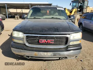 2004 GMC Yukon SLT with VIN 1GKEK13Z24J311546, listed as a Copart auction lot 73772714 with 252,403 mi miles and Salvage Title. Bid and sale history available at carsss.com. Image 5.