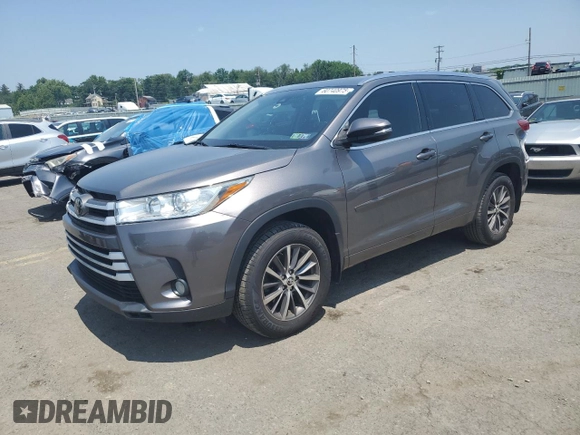 2018 Toyota Highlander SE with VIN 5TDJZRFH4JS875821, listed as a Copart auction lot 60740975 with 106,592 mi miles and Salvage title. Bid and sale history available at DreamBid. Image 1.