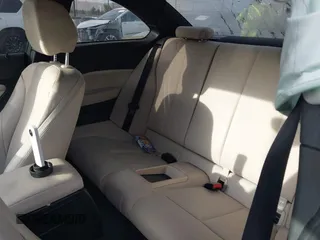 2015 BMW 2 Series 228i with VIN WBA1F5C59FVW98205, listed as a IAAI auction lot 41722804 with 91,879 mi miles. Bid and sale history available at carsss.com. Image 8.