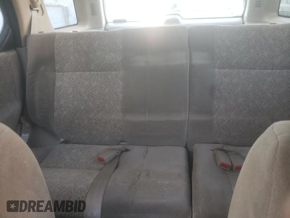 2002 Isuzu Rodeo S with VIN 4S2DM58W824313096, listed as a Copart auction lot 77951364 with 127,470 mi miles and Salvage Title. Bid and sale history available at DreamBid. Image 10.