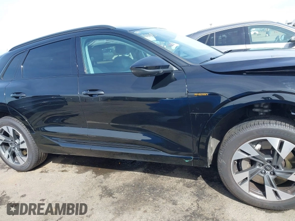 2022 Audi e-tron Premium with VIN WA1AAAGE6NB027461, listed as a IAAI auction lot 41830461 with 25,727 mi miles. Bid and sale history available at carsss.com. Image 14.