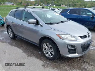 2011 Mazda CX-7 S Touring z VIN JM3ER4C30B0393887, wystawiony jako IAAI lot #42093166 z przebiegiem 123 920 mil mil oraz . Historia ofert i sprzedaży dostępna na DreamBid. Obrazek 1.