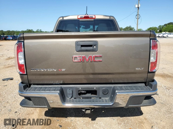 2017 GMC Canyon 2WD SLT z VIN 1GTG5DEN2H1148667, wystawiony jako Copart lot #54824735 z przebiegiem 36 861 mil mil oraz Szkody całkowita. Historia ofert i sprzedaży dostępna na DreamBid. Obrazek 6.