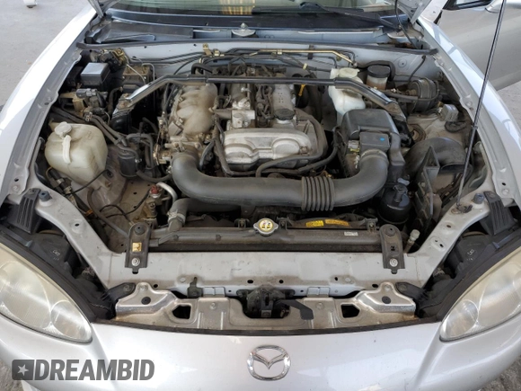 2004 Mazda MX-5 Miata LS z VIN JM1NB353X40404238, wystawiony jako Copart lot #61601895 z przebiegiem 110 549 mil mil oraz Szkoda całkowita • Salvage title. Historia ofert i sprzedaży dostępna na DreamBid. Obrazek 11.
