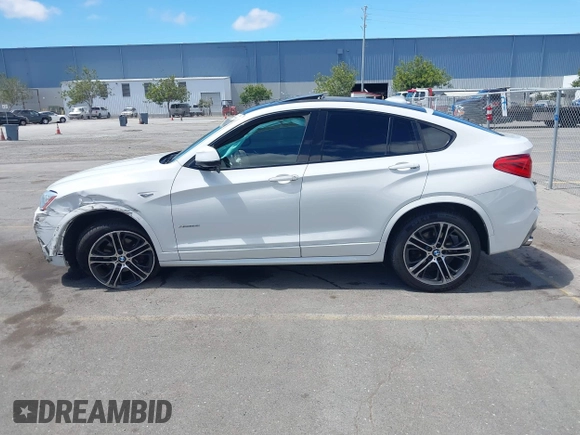 2015 BMW X4 xDrive28i with VIN 5UXXW3C5XF0M89147, listed as a IAAI auction lot 42779290 with 120,773 mi miles and . Bid and sale history available at DreamBid. Image 13.