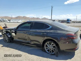 2022 Genesis G70 2.0T with VIN KMTG34TA3NU099562, listed as a Copart auction lot 69646954 with 50,334 mi miles and Salvage Title. Bid and sale history available at carsss.com. Image 2.