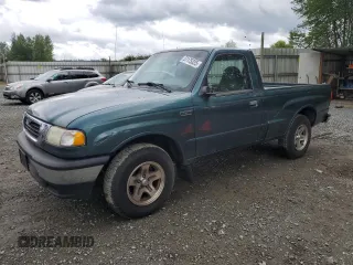 1999 Mazda B-Series Truck SX z VIN 4F4YR12CXXTM22296, wystawiony jako Copart lot #57175325 z przebiegiem 129 333 mil mil oraz Szkody całkowita. Historia ofert i sprzedaży dostępna na DreamBid. Obrazek 1.