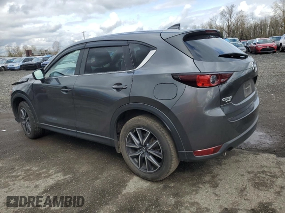 2018 Mazda CX-5 Touring with VIN JM3KFBCM1J0372702, listed as a Copart auction lot 49714595 with 107,805 mi miles and Salvage Title. Bid and sale history available at carsss.com. Image 2.