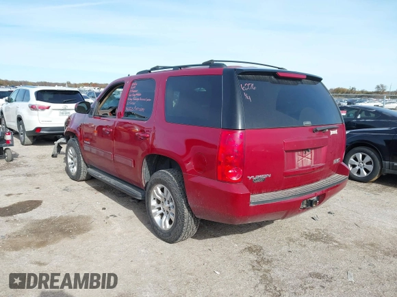 2013 GMC Yukon SLE with VIN 1GKS1AE07DR309832, listed as a IAAI auction lot 41014906 with 203,346 mi miles. Bid and sale history available at carsss.com. Image 3.