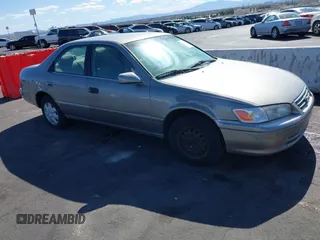 2000 Toyota Camry CE with VIN 4T1BG22K3YU643229, listed as a IAAI auction lot 42162845 with 142,457 mi miles. Bid and sale history available at carsss.com. Image 1.