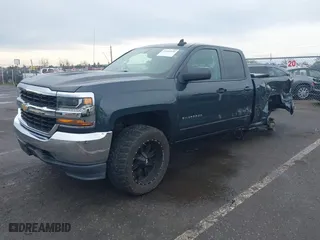 2018 Chevrolet Silverado 1500 LT with VIN 1GCVKREH7JZ268186, listed as a IAAI auction lot 41484090 with 153,392 mi miles. Bid and sale history available at carsss.com. Image 2.