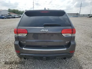 2017 Jeep Grand Cherokee Overland z VIN 1C4RJFCG1HC684826, wystawiony jako Copart lot #59971595 z przebiegiem 101 765 mil mil oraz Szkoda całkowita • Salvage title. Historia ofert i sprzedaży dostępna na DreamBid. Obrazek 6.