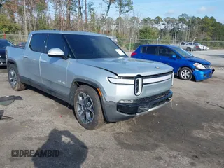 2024 Rivian R1T Adventure with VIN 7FCTGBAA8RN034001, listed as a IAAI auction lot 41101359 with 6,490 mi miles. Bid and sale history available at carsss.com. Image 1.