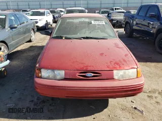 1996 Ford Escort z VIN 1FASP11J0TW138176, wystawiony jako Copart lot #82435494 z przebiegiem 62 107 mil mil oraz Czysty tytuł • Clean title. Historia ofert i sprzedaży dostępna na DreamBid. Obrazek 5.