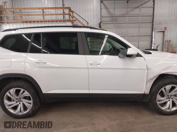 2021 Volkswagen Atlas SE z VIN 1V2HR2CA3MC539997, wystawiony jako IAAI lot #41977786 z przebiegiem 77 372 mil mil oraz . Historia ofert i sprzedaży dostępna na DreamBid. Obrazek 14.