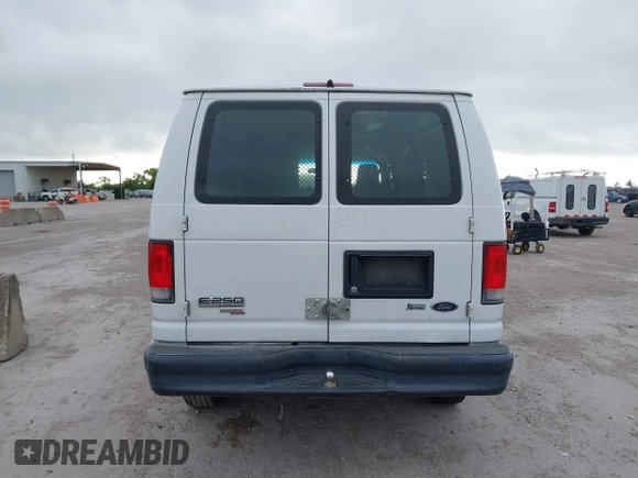 2013 Ford Econoline Cargo Commercial with VIN 1FTNE2EW9DDB02704, listed as a IAAI auction lot 42596289 with 243,629 mi miles and . Bid and sale history available at DreamBid. Image 15.